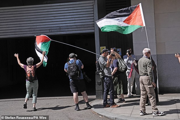 Protesters outside Westminster Magistrates' Court on Thursday waved Palestinian flags