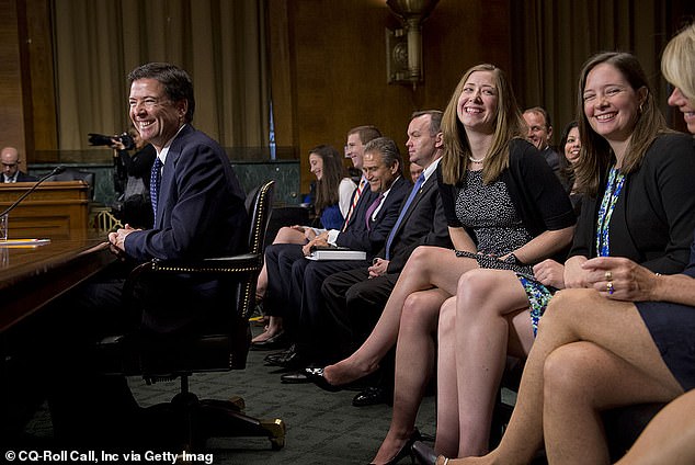 Pictured: Then-nominee for FBI director James Comey with daughters, Kate, Maurene and his wife Patrice)