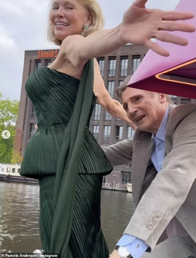 Pamela Anderson and Liam Neeson recreated a memorable Titanic scene at the Naked Gun premiere in Berlin amid rumours they are dating