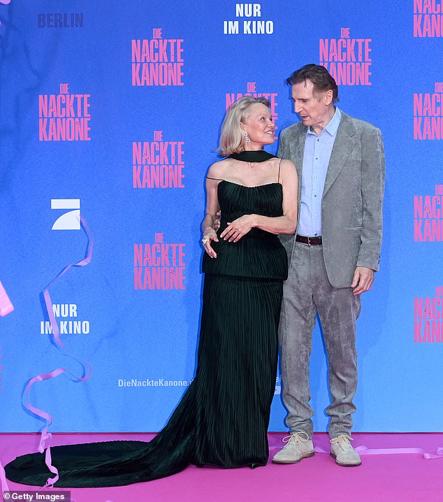 Pamela Anderson, 58, Liam Neeson, 73, put on a cosy display at the premiere of their new film The Naked Gun in Berlin, Germany on Thursday