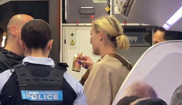 The woman unzipped her bag and insisted she didn't have a vape, but pulled out an opened packet of cigarettes instead