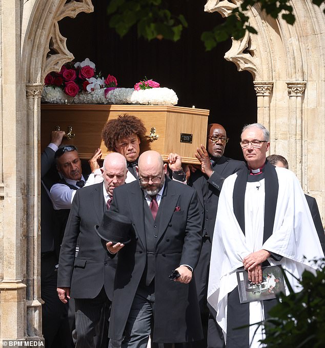 Lawrence was carried by his son at a service attended by family, friends and sporting icons