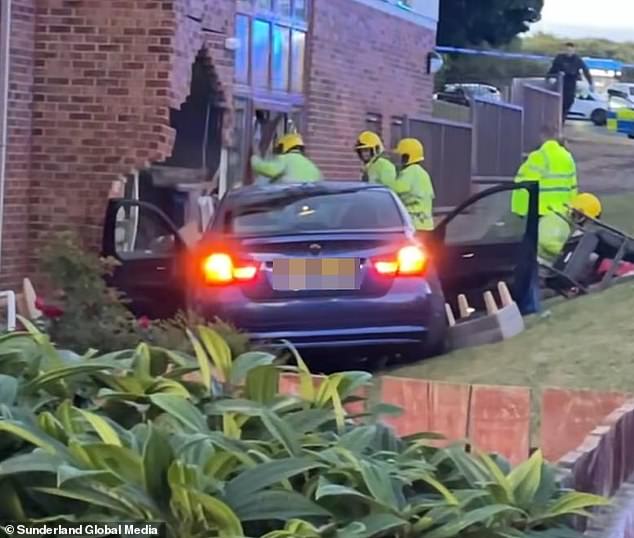 Pictured is the BMW following the alleged crash at the care home earlier this week