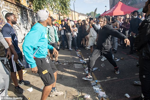 Pictured: A man wielding a large zombie knife during an altercation at Notting Hill Carnival last year