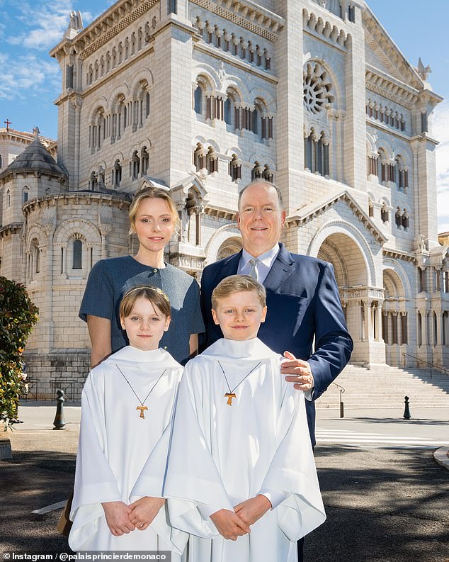 The young royals beamed as they were joined by their parents Prince Albert of Monaco and Princess Charlene at the important religious ceremony