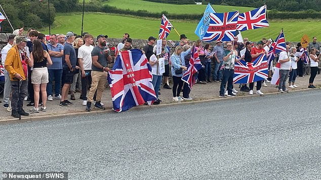 Police were called to a protest outside the construction site of a controversial £2.5million mosque as rival factions clashed
