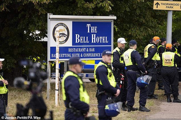 Police officers from forces across the country have been deployed to The Bell Hotel in Epping today