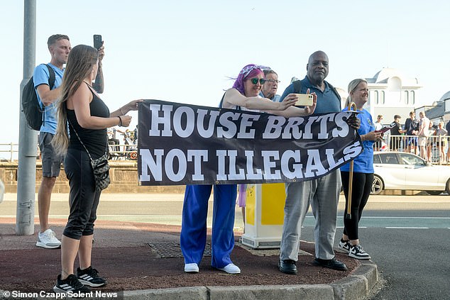 Pictured: Groups of protestors clash outside the Royal Beach Hotel in Southsea, Portsmouth