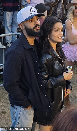 Zegler looked effortlessly chic in a black lace mini-dress
