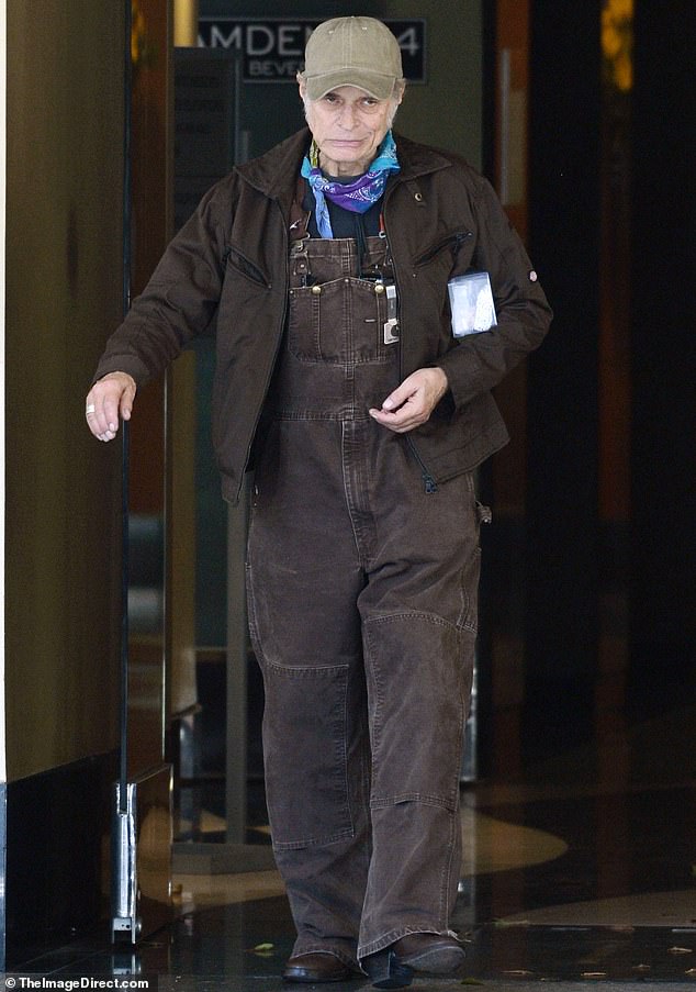 A rock legend was seen embarking on a rare excursion in Los Angeles last week while enjoying the hot summer weather - can you guess who it is?