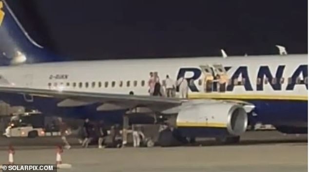 Eighteen people have been injured after a fire broke out on a Ryanair plane at Majorca airport