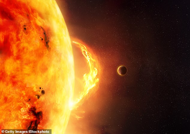 This star has magnetic fields even more powerful than those of our own sun. As the planet orbits, it shakes up these fields and sends waves of energy down to the solar surface. Once the waves hit the end of the field line, they produce devastating solar flares (stock image)
