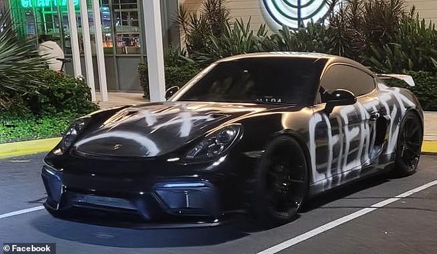 A Porsche graffitied with the word 'cheater' has been see parked in busy public places around the Gold Coast - with Aussies quick to crack jokes at its owner's expense