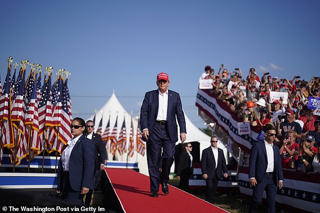 Perez (left) was sent to the location of the rally ahead of time and was specifically tasked with helping to secure the surrounds