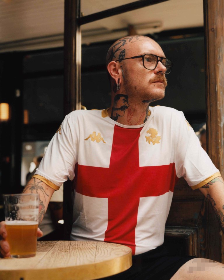 Man wearing Genoa's new away jersey.