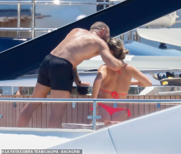 Conor McGregor and his fiancée Dee Devlin continued to pack on the PDA during a yacht holiday in Porto Cervo, Sardinia, despite his alleged cheating scandal