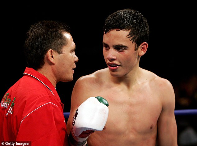 Julio Cesar Chavez Jr. is congratulated by his legendary father after Chavez Jr. defeated Ruban Galvan in the Junior Welterweight fight on June 25, 2005 in Atlantic City