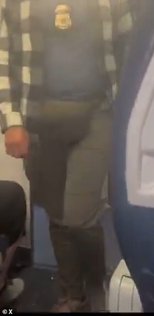 Video shared online showed federal agents in plainclothes wearing badges around their necks entering Flight 2809 from Minneapolis shortly after it landed at the San Francisco International Airport at around 9.35pm on Saturday