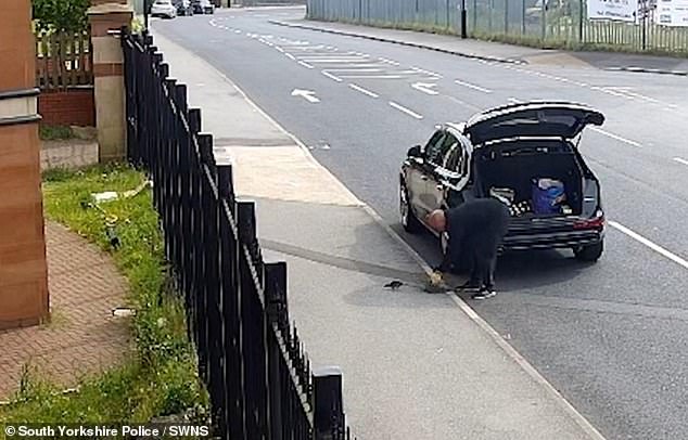 The CCTV footage shows Edmund Fowler letting a rat out of a cage onto the ground of the Grand Mosque in Sheffield at 9:32am on June 2