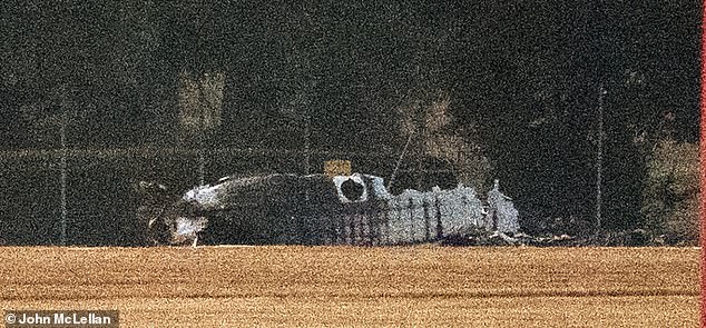 Charred wreckage of the 40ft-long Beech B200 aircraft was seen yards from the runway yesterday evening