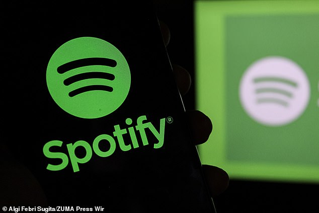 Spotify users have hit out after it emerged the app will now require age verification, with some calling for others to stop using the platform and to 'let them go bankrupt' (stock image)