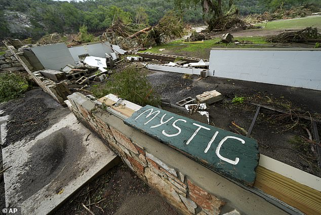 Callie was staying on Senior Hill and was rescued from the massive floods. Many of the younger girls who were in cabins closer to the river lost their lives (Pictured: the campsite ravaged after the flash floods)