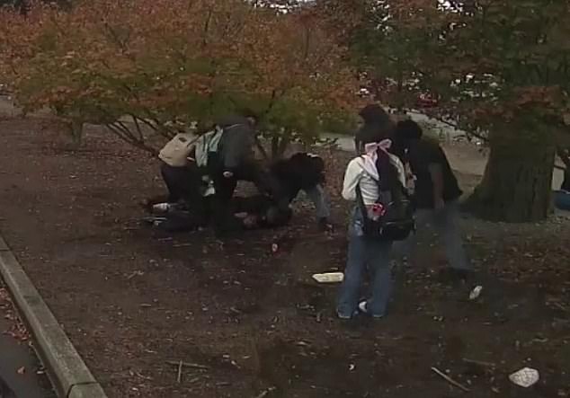 The boys began punching, kicking, and stomping Ihsan as he put his daughter in a chokehold and refused to let go despite the flurry of blows