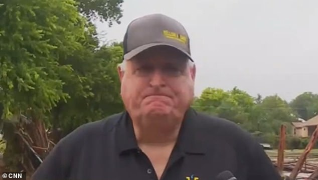A Texas rancher (pictured) held back tears as he spoke with reporters, reacting to the overwhelming destruction caused by a monstrous flash flood that swept through communities across the state on Friday
