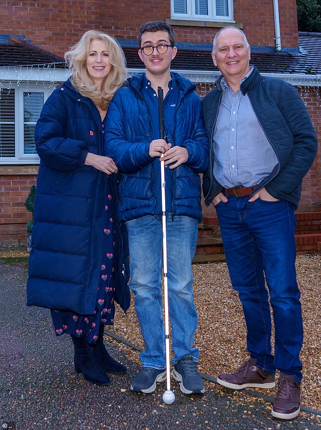 Zac Hollinshead, 16, who is visually impaired, with his parents Suzanne and Ian. They had to remortgage their home to fight the local council, who turned down their EHCP application. They spent £70,000 fighting his case so that he could attend a specialist school for the blind