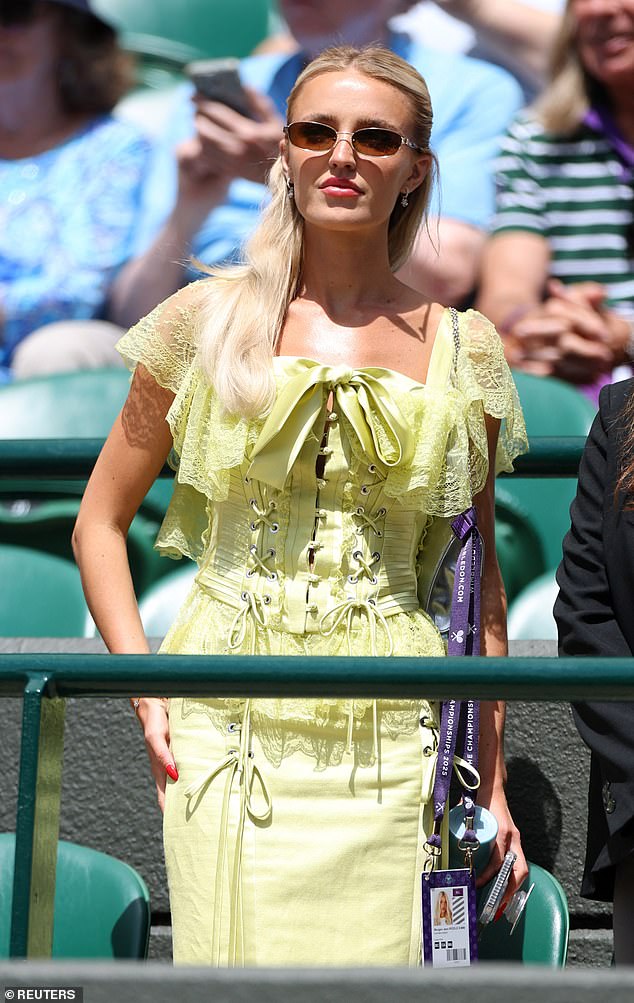 The Minnesota-born influencer -who admits she comes from more of a 'hockey family' has since taken the sports' world by storm on her own accord. It's in part because of her incredible spectator fashion, which includes period-inspired lace dresses. Pictured on Tuesday