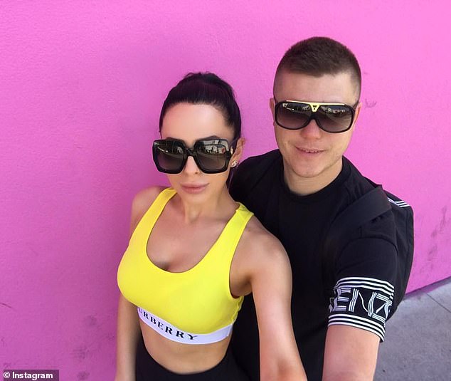 Tyson Scholz, a finance influencer whose social media account is filled with supercars and foreign holidays, had assets seized by a court in Australia last year after being accused of giving unlicensed financial advice. He is pictured with his wife