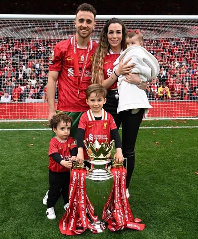 The couple have three children, pictured on the Anfield pitch in May after winning the Premier League
