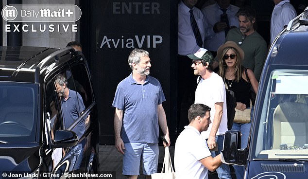 Jennifer Aniston sparked romance rumors with life coach Jim Curtis as they were seen arriving in Mallorca for the Fourth of July weekend