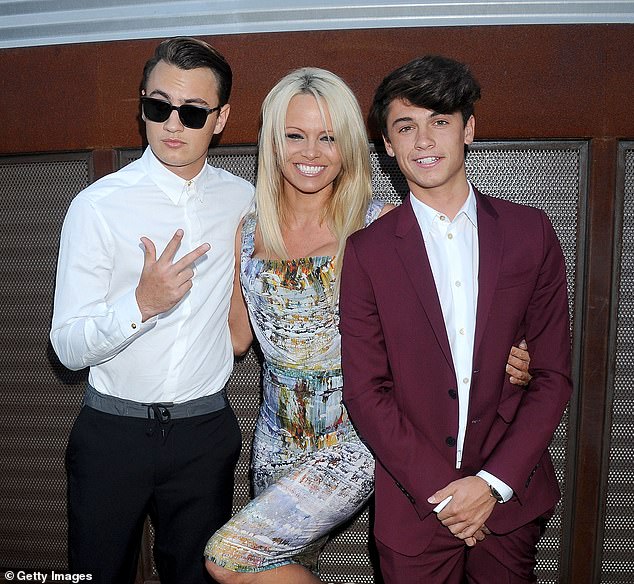 Pamela Anderson, 58, and Liam Neeson, 73, both share special bonds with their sons and can connect over being single parents - as the pair spark fresh romance rumours (Pamela pictured with children Brandon Thomas and Dylan Jagger)