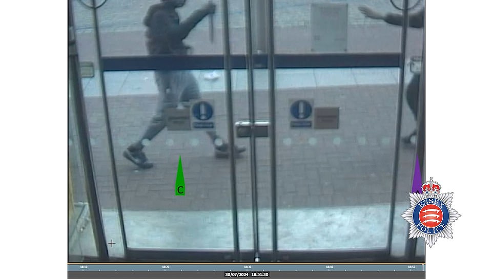 A 16-year-old member of the Southside Newham gang, who can't be named due to his age, wields a large knife outside the Halifax bank in Southend high street. A placating hand is raised as he approaches an individual