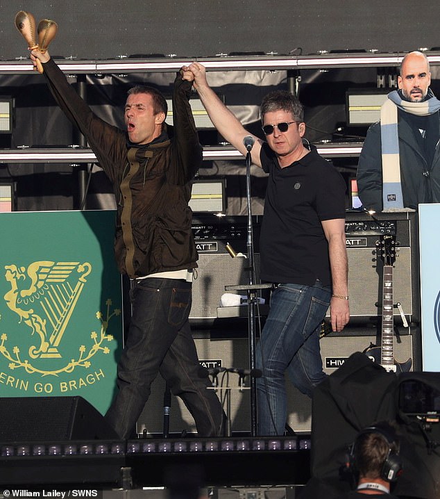 Brothers Liam and Noel Gallagher performed in front of a sold-out 80,000 strong crowd in their home city of Manchester