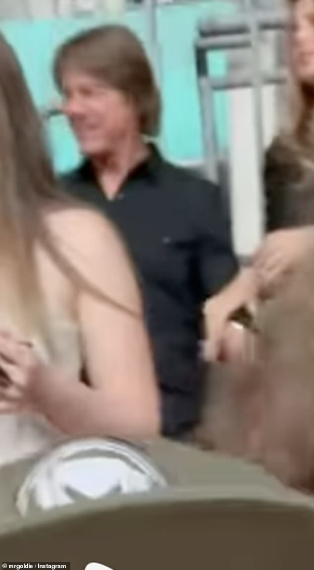 The Mission Impossible star, 63, was among a number of famous faces in the crowd, turning up to watch Liam and Noel Gallagher reunite on stage in front of 90,000 fans