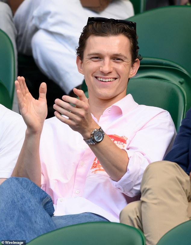 Tom Holland (pictured on Tuesday) and Bradley Cooper surprised fans dining at Gordon Ramsay 's Lucky Cat restaurant in Bishopsgate, London on Monday