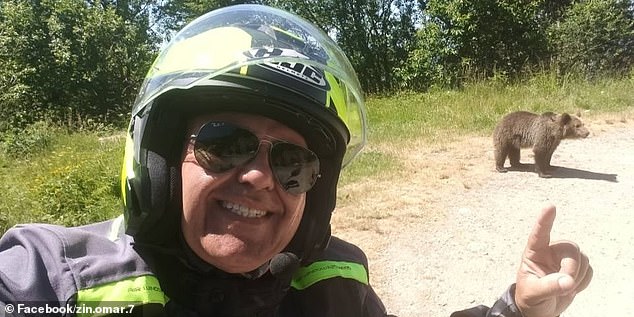 Italian motorcyclist Omar Farang Zin was mauled to death by a bear in Romania on Thursday after posing for a selfie with its cub