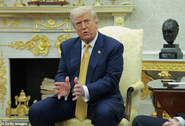 Trump told press in the Oval Office on Wednesday that although he doesn't 'rule out anything' it is 'highly unlikely' he'd fire Powell