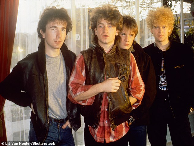 Bono's rise to fame began in 1976 when he formed a band with schoolmates in Dublin. The group named U2, quickly made a name for themselves with their raw sound and electrifying stage presence (Bono pictured with The Edge, Larry Mullen JR, and Adam Clayton in 1982)