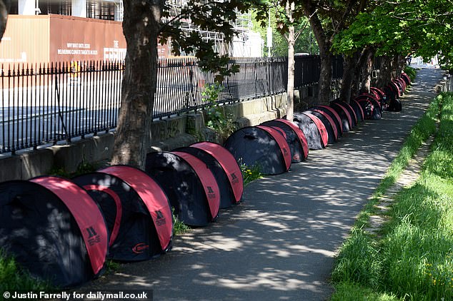 Pictured: asylum seekers pitched up tents along Dublin's Grand Canal in May 2024 as part of a makeshift camp