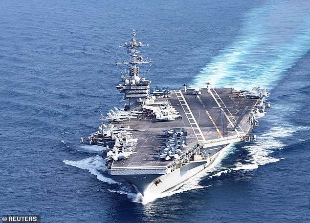 A US Navy sailor is feared dead after falling overboard the USS George Washington off the coast of Darwin on Monday