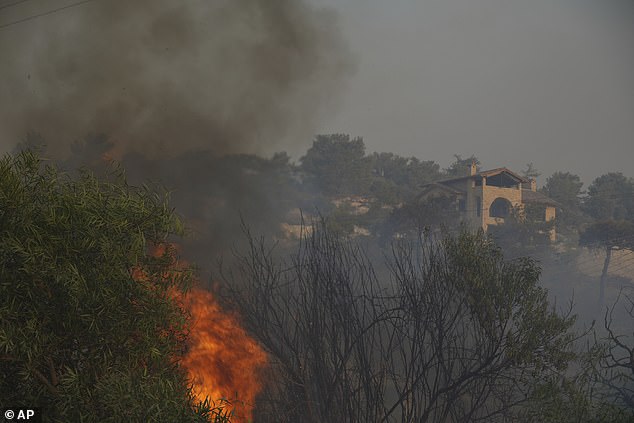 Holiday hotspot Cyprus has been hit by wildfires in recent days, with homes and holiday properties burnt down and people have reportedly died. Pictured: Flames in Souni village, Cyprus on Thursday, July 24, 2025