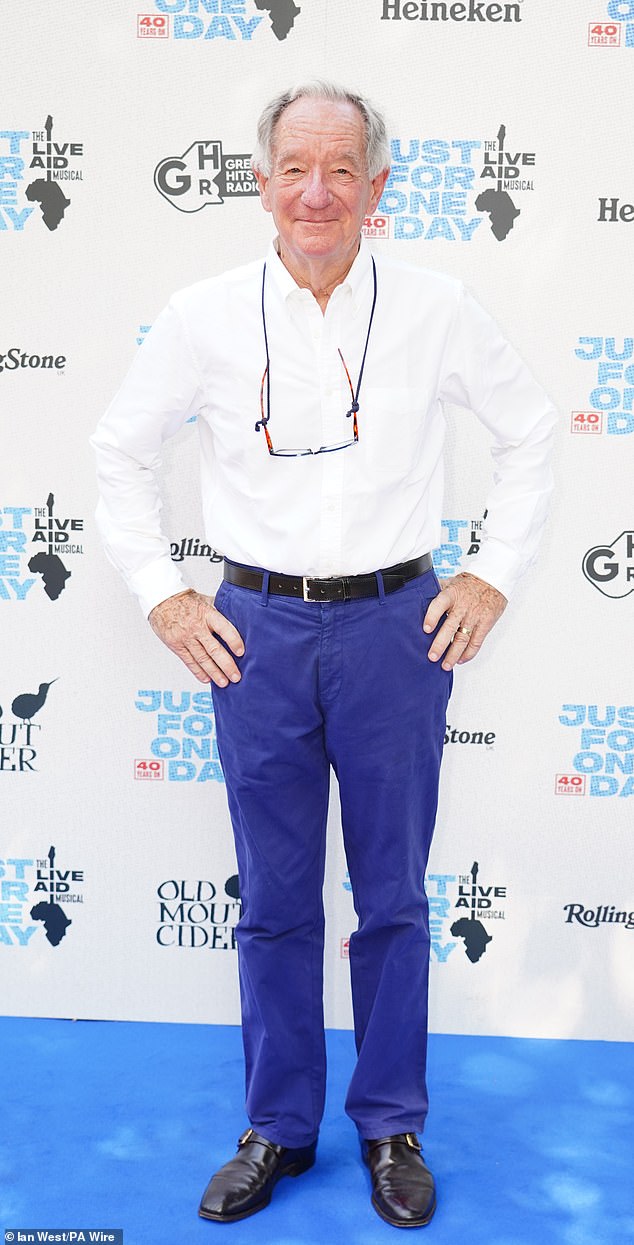 Michael Buerk (pictured), 79, hit out at ‘white saviour’ criticism of the Live Aid concerts yesterday, branding the controversy ‘obscene’. Pictured: Mr Buerk at the 40th Anniversary Gala for Live Aid