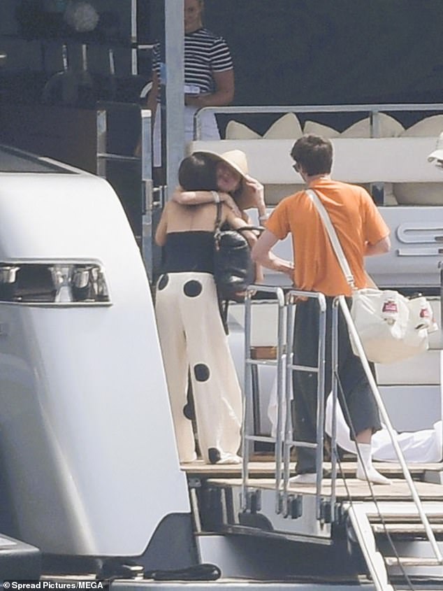 Victoria Beckham, 51, looked thrilled to welcome her beloved son Cruz, 20, and his girlfriend Jackie Apostel, 30, onboard her and David's £16million yacht in St Tropez on Monday