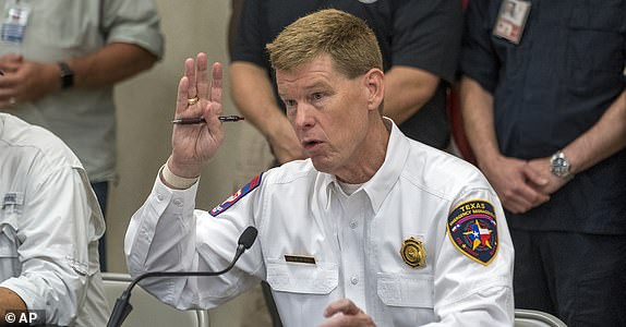 Texas Division of Emergency Management Chief Nim Kidd speaks to media about the ongoing search and rescue efforts following recent flooding along the Guadalupe River during a press conference on Saturday, July 5, 2025, in Kerrville, Texas. (AP Photo/Rodolfo Gonzalez)