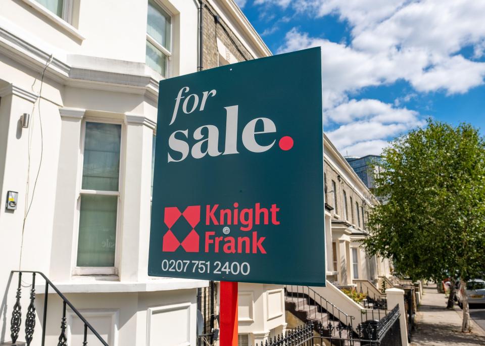 Knight Frank for sale sign outside a house.