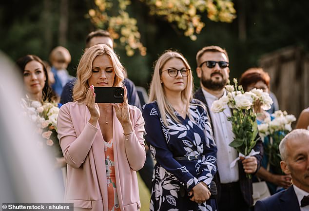 A woman revealed on Reddit that she was invited to 'a disaster of a wedding' where children screamed throughout the entire ceremony and she had to pay for water (stock image)
