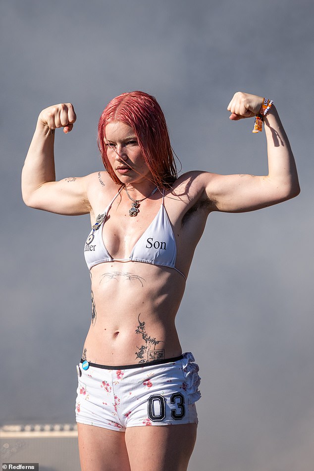 Rhian Teasdale of British indie-rock band Wet Leg showed off her toned abs and bulging biceps after taking to the stage at TRNSMT Festival on Friday